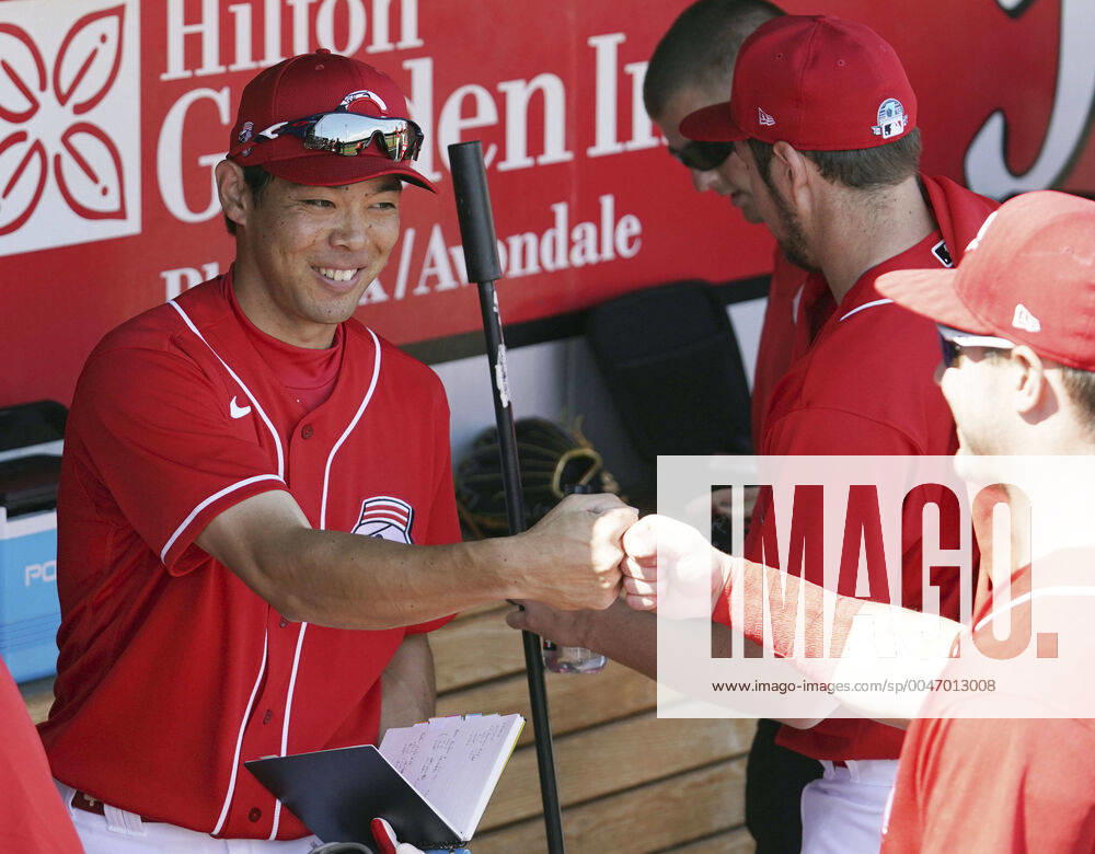 MLB, Baseball Herren, USA spring training Shogo Akiyama of the Cincinnati Reds bumps fists with a teammate before a spring training game against the Los Angeles Angels on March 8, 2020, in Goodyear, Arizona.