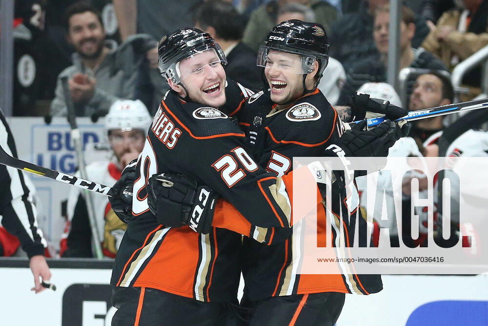 Anaheim Ducks left wing Nicolas Deslauriers (20) and Anaheim Ducks defenseman Jacob Larsson (32) celebrate a hat trick in the first period by Deslauriers during the game between the Ottawa Senators and the Anaheim Ducks at the Honda Center in Anaheim, CA, ( ) Anaheim I.E. United States of America - ZUMAc04_ 20200310_zaf_c04_175