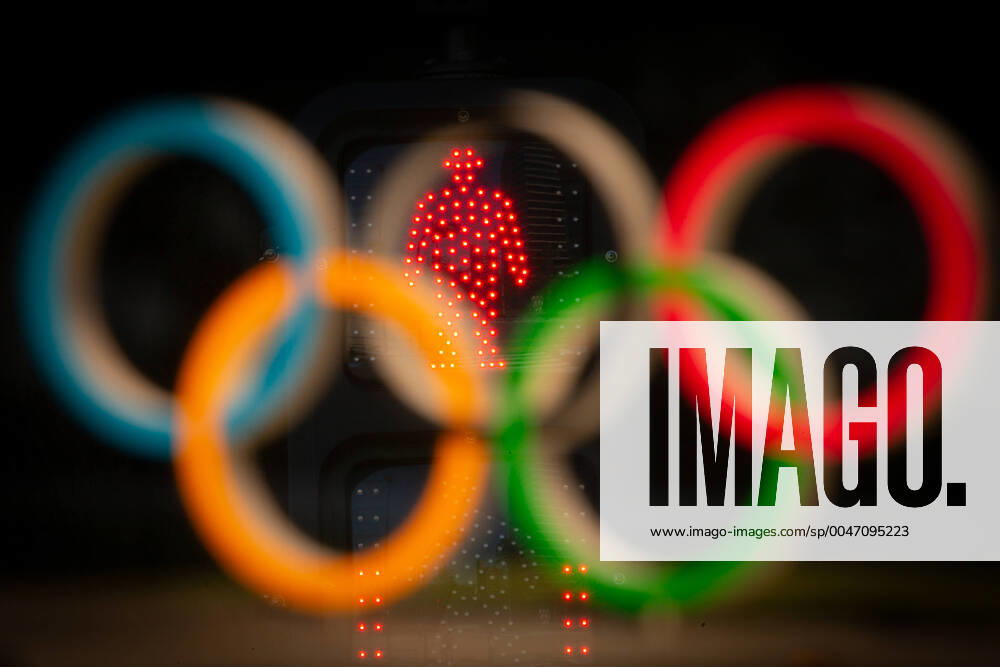 KW13 In this multi-exposure picture, the Olympic rings and red light are seen in Tokyo, Japan on March 25, 2020, a day after the Tokyo 2020 Olympic and Paralympic Games postponement was announced due to the coronavirus outbreak. Noxthirdxpartyxsales (98467652st)