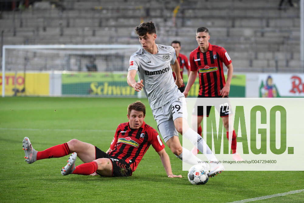 KW22 SC Freiburg - Bayer 04 Leverkusen, 29.05.2020 Dominique Heintz (SC Freiburg, l.) gegen Kai Havertz (Leverkusen, r.). Fussball: 1. Bundesliga: Saison 19 20: 29. Spieltag: SC Freiburg - Bayer 04 Leverkusen, 29.05.2020 Foto: Markus Gilliar GES POOL via David Inderlied Kirchner-Media Nur für journalistische Zwecke! Only for editorial use! Gemäß den Vorgaben der DFL Deutsche Fußball Liga ist es untersagt, in dem Stadion und oder vom Spiel angefertigte Fotoaufnahmen in Form von Sequenzbildern und oder videoähnlichen Fotostrecken zu verwerten bzw. verwerten zu lassen. DFL regulations prohibit any use of photographs as image sequences and or quasi-video. National and international news-agencies out. Freiburg BW Deutschland