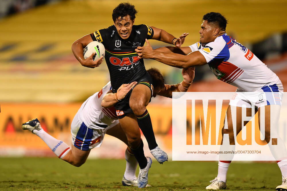 KW22 NRL PANTHERS KNIGHTS, Jarome Luai of the Panthers is tackled by Tim Glasby of the Knights during the Round 3 NRL match between the Penrith Panthers and the Newcastle Knights at Campbelltown Stadium in Sydney, Sunday, May 31, 2020. ( NO ARCHIVING, , NO USE IN BOOKS WITHOUT CONSENT SYDNEY NSW AUSTRALIA