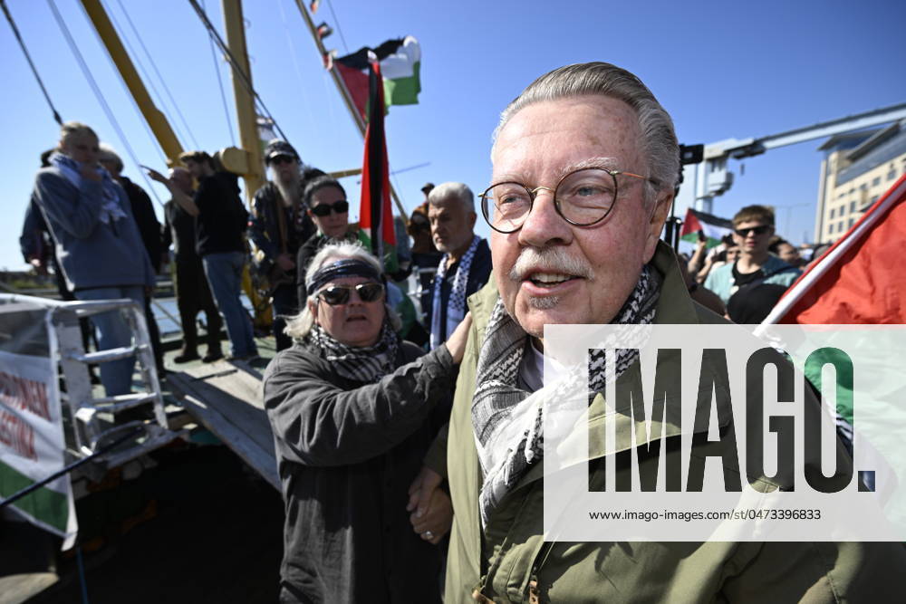 MALMÖ, SWEDEN 20240508 Mikael Wiehe as the Ship to Gaza boat Handala arrives at Angbatsbron in the harbor of Malmö, Sweden, Wednesday 08 May, 2024 The visit of Ship to Gaza and the demonstration in connection with this is part of the protests against Israels participation in the 68th edition of the Eurovision Song Contest ESC at Malmö Arena MALMÖ SWEDEN