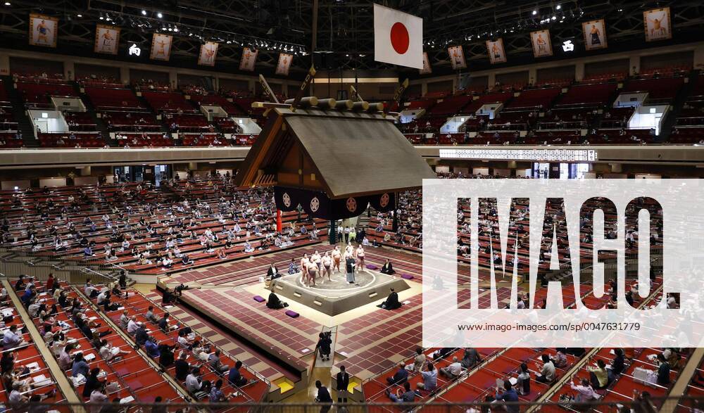 KW29 Sumo: July tourney begins, allows up to 2,500 fans a day Sumo wrestlers gather in the raised ring on the first day of the July Grand Sumo Tournament at Ryogoku Kokugikan in Tokyo on July 19, 2020. The tournament allows up to about 2,500 spectators per day amid concerns over coronavirus infections.