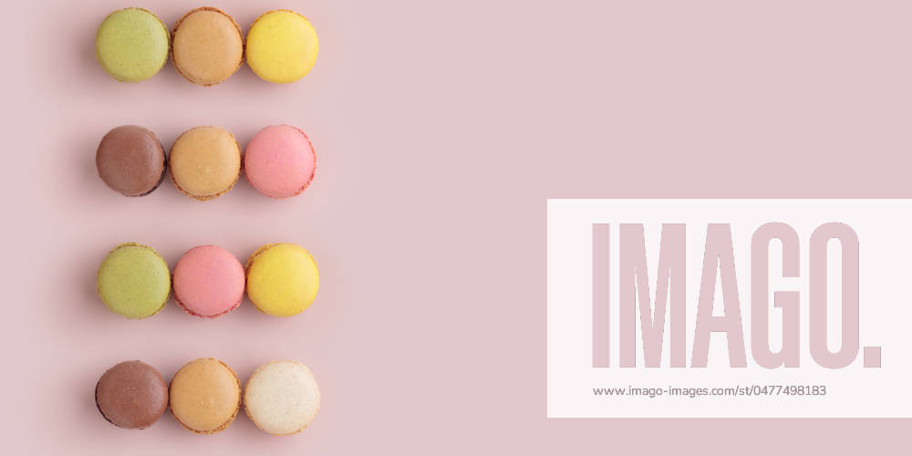 Macaroons on pink background, colorful french cookies pattern. Gift for 8 March, International Women s Day, Valentine Day Macaroons on pink background, colorful french cookies pattern. Gift for 8 March, International Women s Day, Valentine Day. Horizontal banner with copyspace