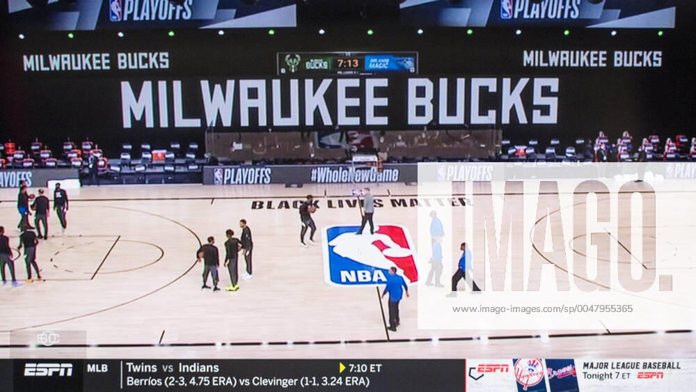 A screen grab from ESPN s coverage of the Milwaukee Bucks refusing to play today s scheduled playoff game against the Orlando Magic. After a team meeting, the Bucks decided to boycott their game in the wake of the shooting of yet another Black man, Jacob Blake, at the hands of a white policeman, this time in Kenosha, Wisconsin. After the Bucks declined to play, the Rockets also decided to boycott. Other teams have now joined the boycott, and no playoff games will be played tonight. Orlando USA - ZUMAce6_ 20200826_zaf_ce6_014