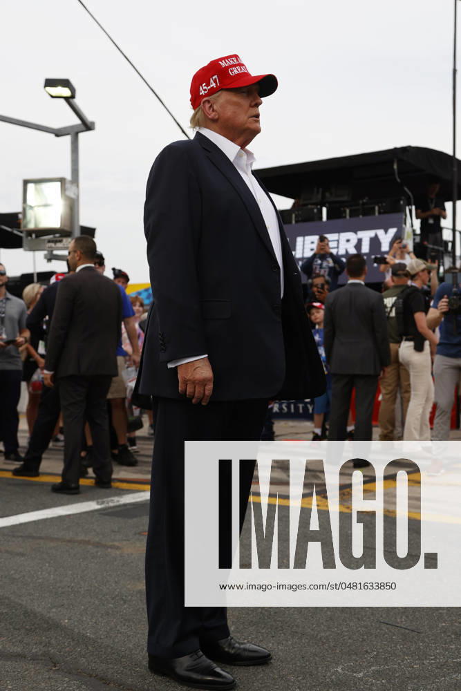 CHARLOTTE, NC - MAY 26: Former President of the United States of America Donald Trump on pit road prior to the running of the NASCAR Cup Series Coca-Cola 600 on May 26, 2024 at Charlotte Motor Speedway in Charlotte, NC. (Photo by Jeff Robinson Icon Sportswire) Icon1045686823