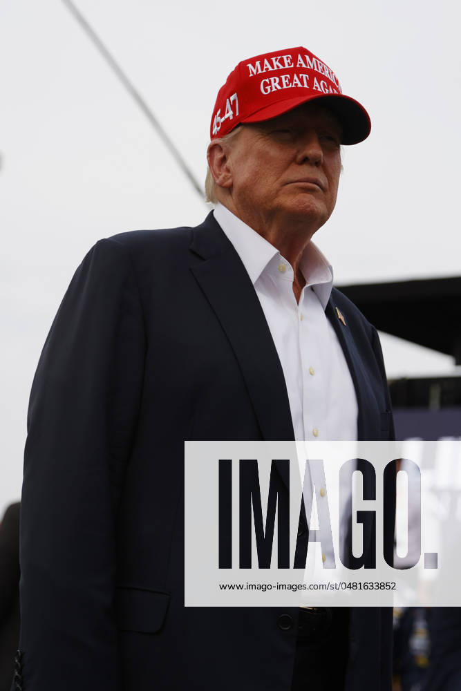 CHARLOTTE, NC - MAY 26: Former President of the United States of America Donald Trump on pit road prior to the running of the NASCAR Cup Series Coca-Cola 600 on May 26, 2024 at Charlotte Motor Speedway in Charlotte, NC. (Photo by Jeff Robinson Icon Sportswire) Icon1045686833