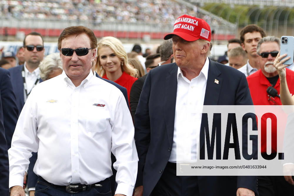 CHARLOTTE, NC - MAY 26: Former President of the United States of America Donald Trump walks down pit road with Richard Childress on pit road prior to the running of the NASCAR Cup Series Coca-Cola 600 on May 26, 2024 at Charlotte Motor Speedway in Charlotte, NC. (Photo by Jeff Robinson Icon Sportswire) Icon1045694110