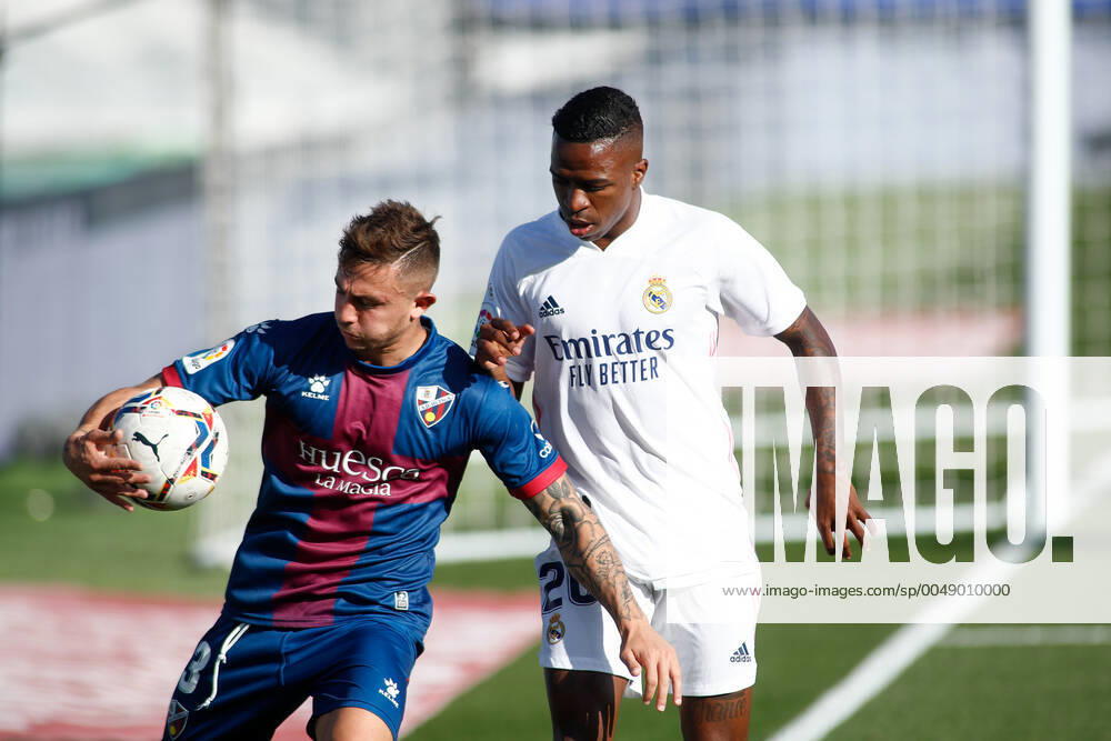 Vinicius Junior of Real Madrid and Pablo Maffeo of Huesca in action during the spanish league, La Liga Santander, football match played between Real Madrid and SD Huesca at Alfredo Di Stefano stadium on October 31, 2020, in Valdebebas, Madrid, Spain. Valdebebas SPAIN - ZUMAa181 20201031_zaa_a181_132