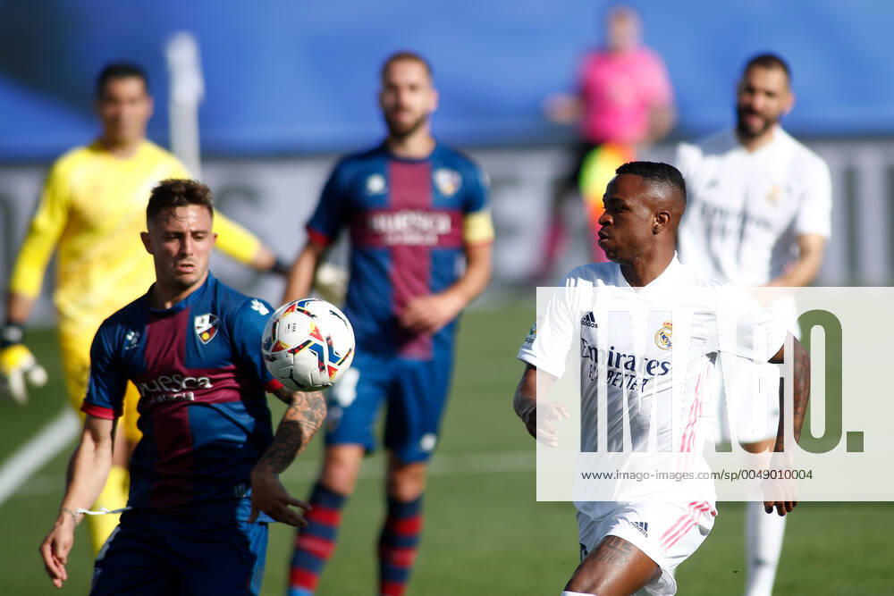 Vinicius Junior of Real Madrid and Pablo Maffeo of Huesca in action during the spanish league, La Liga Santander, football match played between Real Madrid and SD Huesca at Alfredo Di Stefano stadium on October 31, 2020, in Valdebebas, Madrid, Spain. Valdebebas SPAIN - ZUMAa181 20201031_zaa_a181_134