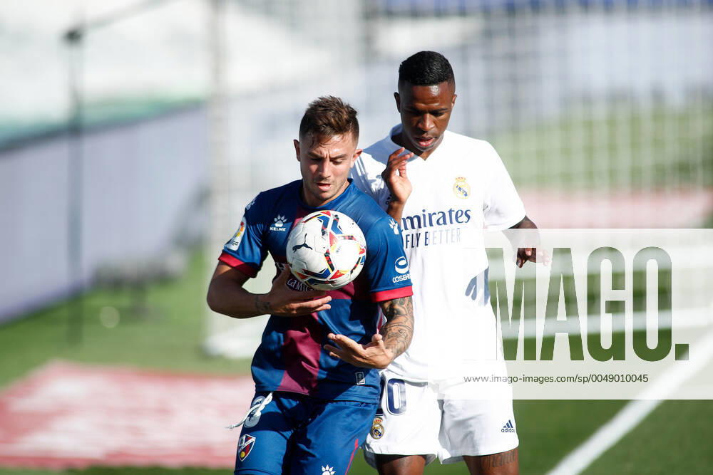 Vinicius Junior of Real Madrid and Pablo Maffeo of Huesca in action during the spanish league, La Liga Santander, football match played between Real Madrid and SD Huesca at Alfredo Di Stefano stadium on October 31, 2020, in Valdebebas, Madrid, Spain. Valdebebas SPAIN - ZUMAa181 20201031_zaa_a181_136