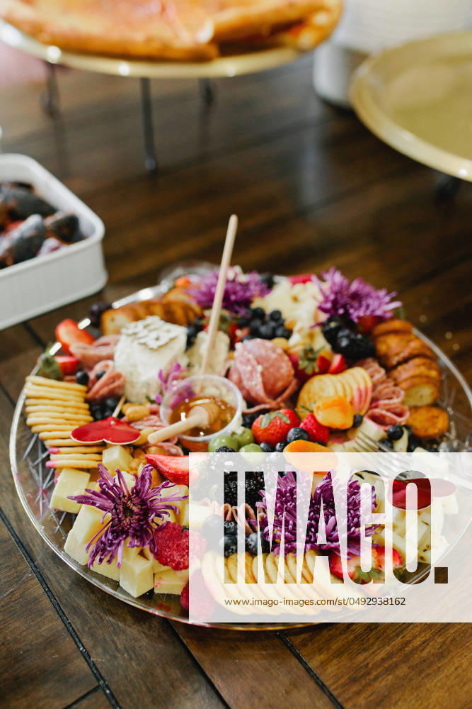 Charcuterie board with fresh honey, meats, cheeses and Valentine s Day Wildwood, New Jersey, United States R_KJVE240509-1425255-01