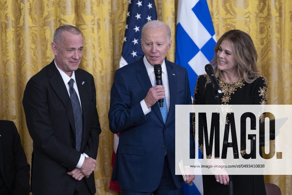 President Joe Biden speaks at a reception celebrating Greek Independence Day United States President Joe Biden speaks with Actor Tom Hanks and Rita Wilson actress, producer and singer songwriter after she performed at a reception celebrating Greek Independence Day at the White House in Washington, DC, on March 29, 2023. Credit: Chris Kleponis CNP Washington District of Columbia United States of America