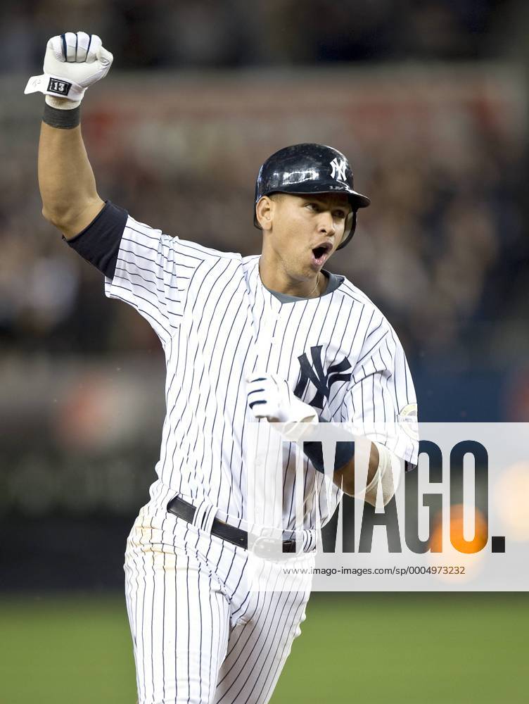 10 07 09 NY Yankees practice for the first game of the ALDS. Yankee Alex Rodriguez reacts as he rounds the bases on Hideki Matsui s two run homer in the 5th inning. Icon94260371007609
