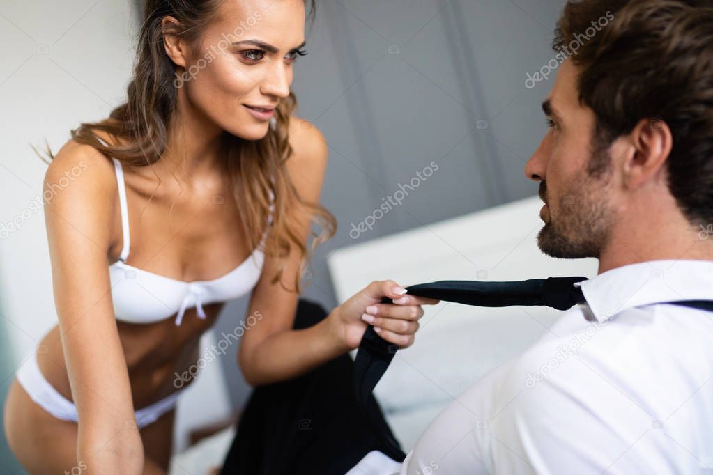 Playful sexy couple in love affectionate in the morning model released