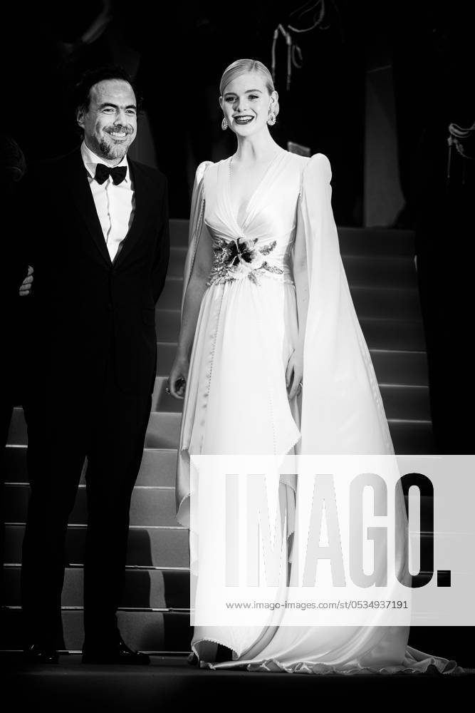 Alejandro Gonzalez Inarritu and Elle Fanning poses on the red carpet for the opening night film, The Dead Don t Die on Tuesday 14 May 2019 at the 72nd Festival de Cannes Alejandro Gonzalez Inarritu and Elle Fanning poses on the red carpet for the opening night film, The Dead Dont Die on Tuesday 14 May 2019 at the 72nd Festival de Cannes, Palais des Festivals, Cannes. Pictured: Alejandro Gonzalez Inarritu , Elle Fanning. Editors Note: This image as been converted to monochrome. LFI Avalon. All usages must be credited Julie Edwards LFI Avalon. Picture by Julie Edwards LFI Avalon. All usages must be credited Julie Edwards LFI Avalon.,