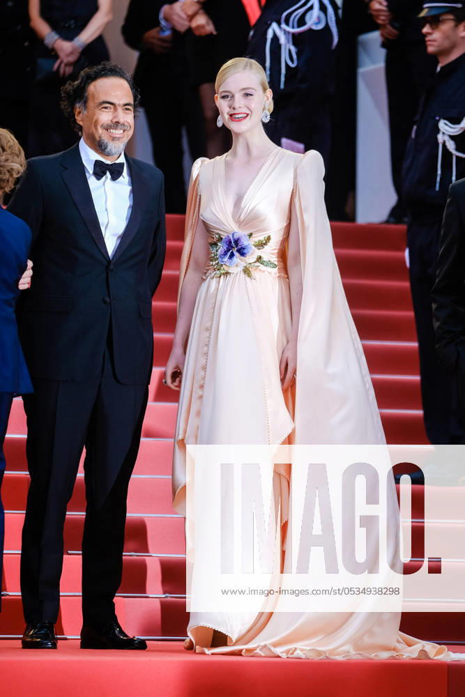 Alejandro Gonzalez Inarritu and Elle Fanning poses on the red carpet for the opening night film, The Dead Don t Die on Tuesday 14 May 2019 at the 72nd Festival de Cannes Alejandro Gonzalez Inarritu and Elle Fanning poses on the red carpet for the opening night film, The Dead Don t Die on Tuesday 14 May 2019 at the 72nd Festival de Cannes, Palais des Festivals, Cannes. Pictured: Alejandro Gonzalez Inarritu , Elle Fanning. LFI Avalon. All usages must be credited Julie Edwards LFI Avalon. Picture by Julie Edwards LFI Avalon. All usages must be credited Julie Edwards LFI Avalon.,