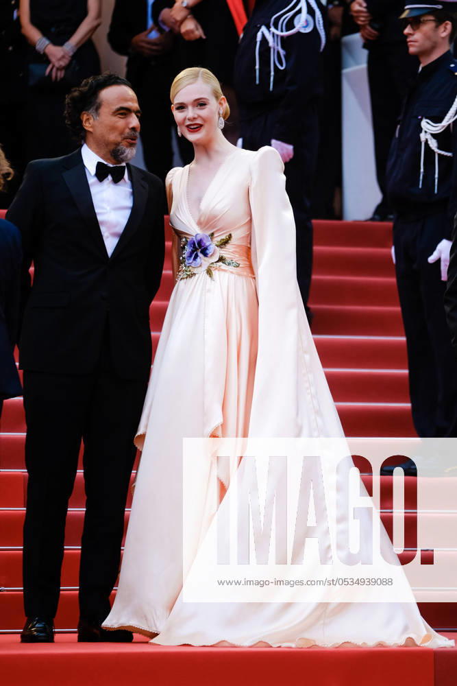 Alejandro Gonzalez Inarritu and Elle Fanning poses on the red carpet for the opening night film, The Dead Don t Die on Tuesday 14 May 2019 at the 72nd Festival de Cannes Alejandro Gonzalez Inarritu and Elle Fanning poses on the red carpet for the opening night film, The Dead Don t Die on Tuesday 14 May 2019 at the 72nd Festival de Cannes, Palais des Festivals, Cannes. Pictured: Alejandro Gonzalez Inarritu , Elle Fanning. LFI Avalon. All usages must be credited Julie Edwards LFI Avalon. Picture by Julie Edwards LFI Avalon. All usages must be credited Julie Edwards LFI Avalon.,
