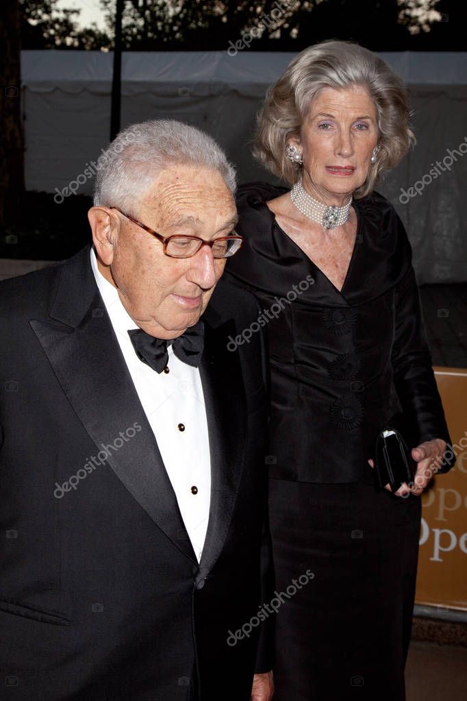 Dr. Henry Kissinger and his wife Nancy Kissinger arrive at the season opening of the Metropolitan Opera, with the new production of Tosca, in New York City.