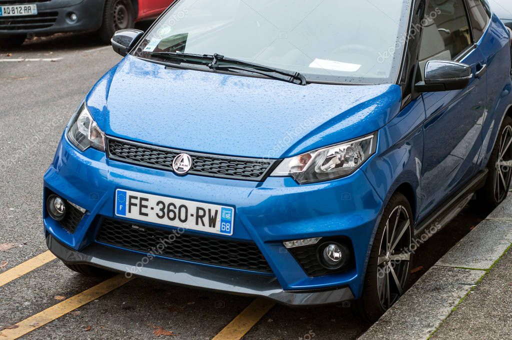 Mulhouse - France - 8 November 2019 - Front view of blue Aixam microcar parked in the street