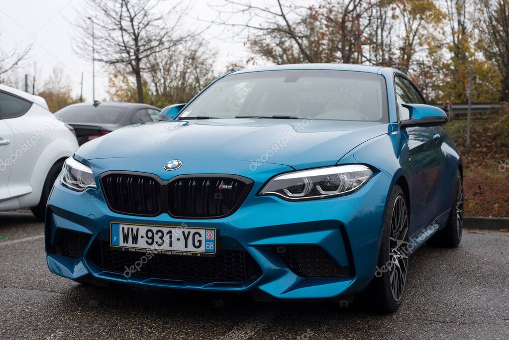 Mulhouse - France - 14 November 2021 - Front view of blue BMW M2 parked in the street