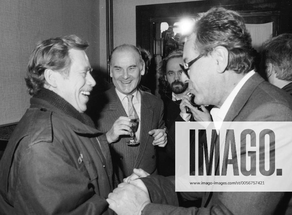 Civic Forum leader Vaclav Havel, left, meets his long-time friend Milos Forman, Czech Oscar-winning film director, at the screening of his film Valmont in Prague on December 15, 1989. Forman, who became a naturalized citizen of the United States in 1977, came to Czechoslovakia to support the Velvet Revolution. Czech Oscar-winning costume designer Theodor Pistek smiles in the middle.Vaclav Havel died on Sunday, Dec. 18, 2011, aged 75. Havel, a dissident playwright jailed by Communists, became Czechoslovak and than Czech president and a symbol of peace and freedom after bringing down communism in Czechoslovakia by leading bloodless Velvet Revolution . CTKPhoto46900473404
