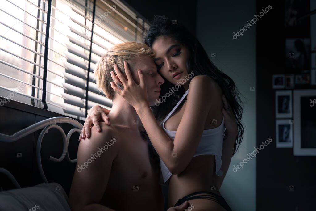 Couple is having sex in bed. model released