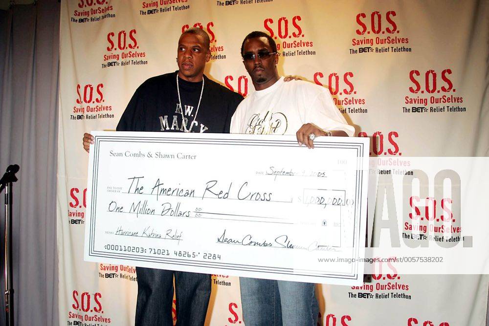 Mar. 2, 2000 - New York, New York, U.S. - K44933RM.TELETHON TO RAISE MONEY FOR THE VICTIMS OF HURRICANE, KATRINA . SPONSORED BY B.E.T..CBS STUDIOS, NEW YORK New York. .09-09-2005. PHTOOS INC © 2005.JAY-Z AND SEAN DIDDY COMBS New York U.S. - ZUMAmk1