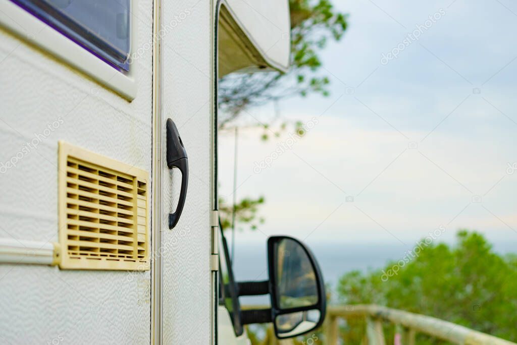 Camper car detail. Grid, ventilation plate for fridge. Caravan vacation.