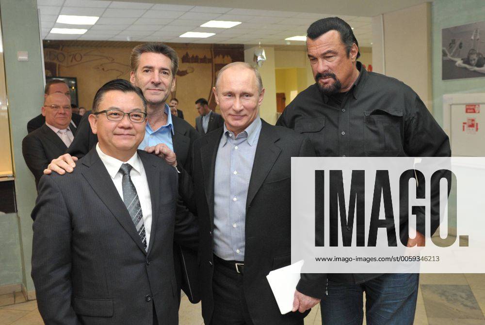 MOSCOW, RUSSIA. MARCH 13, 2013. U.S. actor Steven Seagal and President of Russia Vladimir Putin (from R) visiting Sambo-70 educational center in Moscow. RE116349