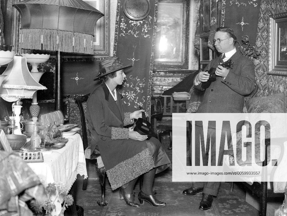 Musical Tramp and Antiques is the dual role in life of Mr Will Van Allen , An Old Music Hall turn who is now a dealer in fine antiques at his shop in Charing Cross Road . He entertains customers whilst they examine his wares . 15 January 1923 UnitedArchives00109870