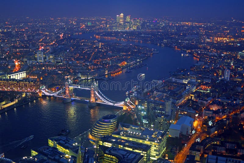 London rooftop view panorama at sunset with urban architectures, London rooftop view panorama at sunset with urban architectures and The Tower Bridge with Thames River at night