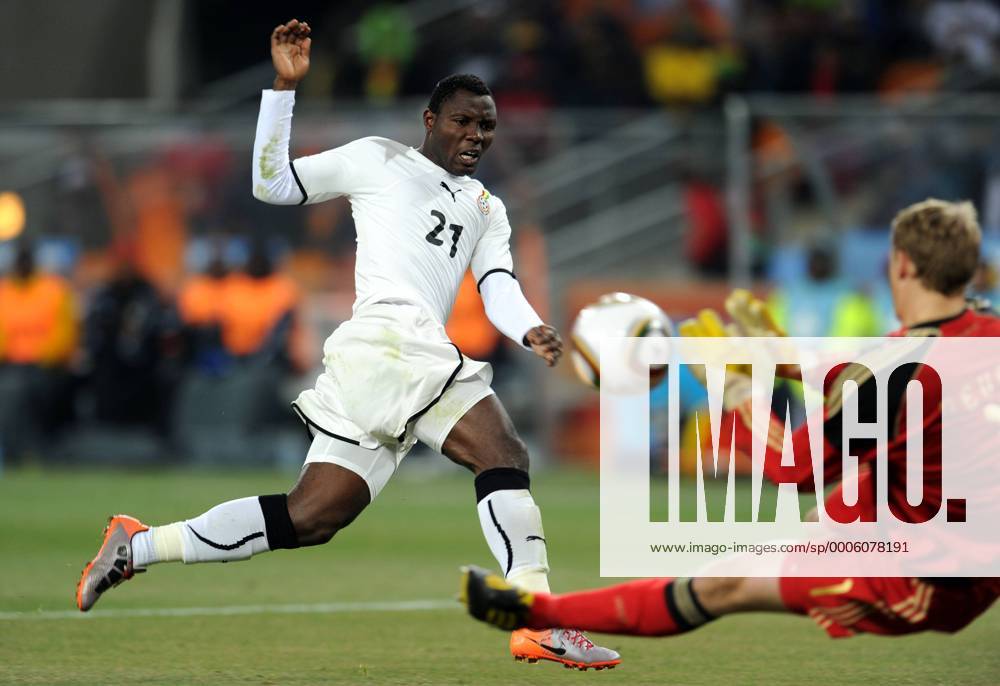 Ghana s Kwadwo Asamoah (L) kicks the ball against Manuel Neuer of Germany during the 2010 World Cup Group D match against Germany in Johannesburg