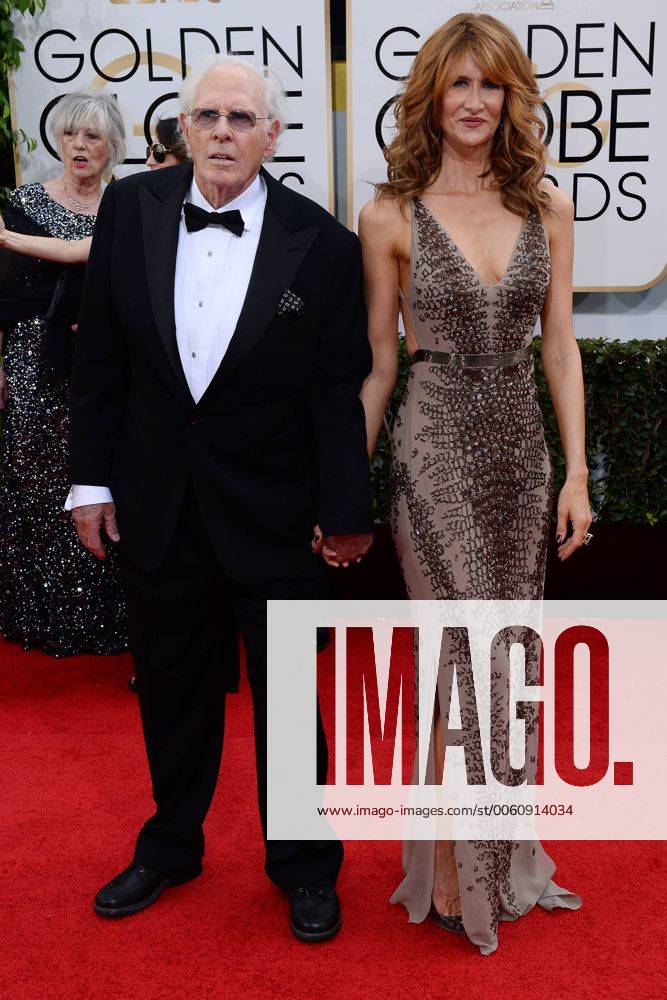 Actor Bruce Dern (L) and actress Laura Dern arrive for the 71st annual Golden Globe Awards at the Beverly Hilton Hotel in Beverly Hills, California on January 12, 2014. LAP20140112206