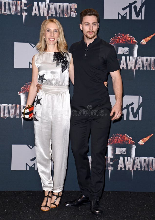 Sam Taylor-Johnson and Aaron Taylor-Johnson, Sam Taylor-Wood and Aaron Taylor-Johnson at the 2014 MTV Movie Awards - Press Room held at the Nokia Theatre L.A. Live in Los Angeles on April 13, 2014 in Los Angeles, California.
