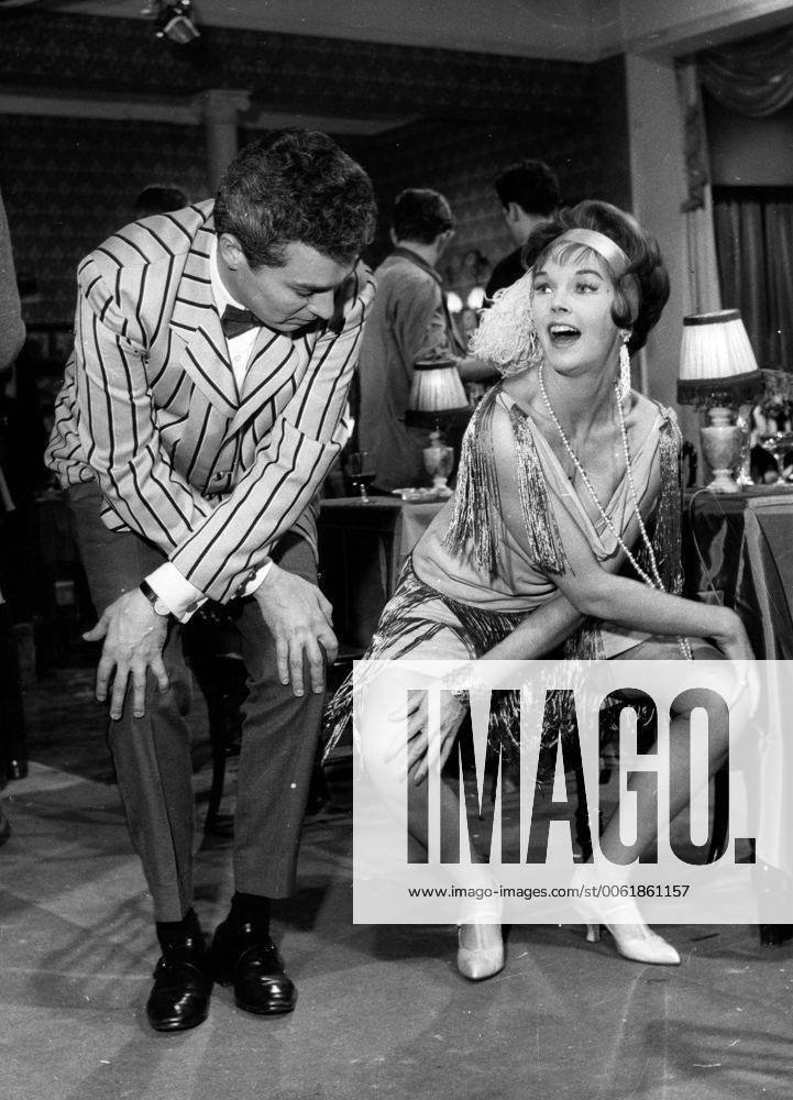 Sep. 14, 1961 - London, England, U.K. - Actress DAWN ADDAMS and SYDNEY CHAPLIN have a private jive session at Walton Studios during time off from their latest film. Follow that man now in production there. The film involves Sydney, son of Charlie Chaplin, as a gangster with all the charm in the world while Addams plays the part of the cutest little newspaper woman. London United Kingdom - ZUMAk09