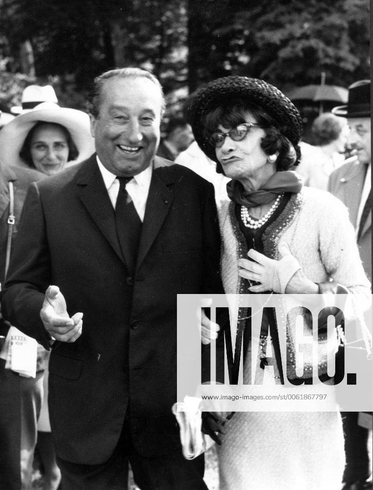 IMAGO ICONS: Coco Chanel Jan. 1, 1968 - Paris, France - COCO CHANEL (born Gabrielle Bonheur Chanel) was a pioneering French fashion designer whose modernist philosophy, menswear-inspired fashions, and pursuit of expensive simplicity made her arguably the most important figure in the history of 20th-century fashion. PICTURED: Chanel walking with a man. Paris France - ZUMAk09
