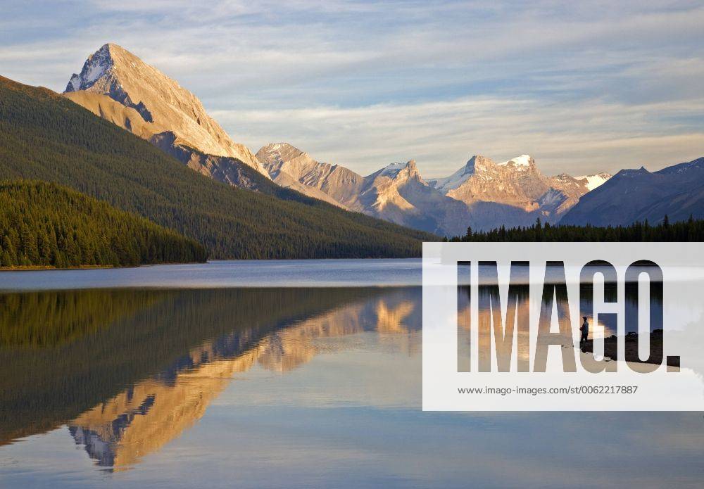 Male fly fisherman at Maligne Lake, Jasper National Park, Alberta, Canada. acp65816 Photography