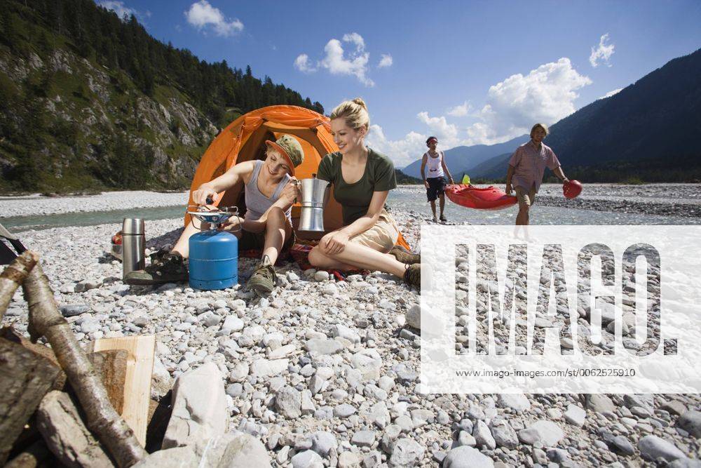 Germany, Bavaria, Tölzer Land, Young friends camping model released WESTF09938