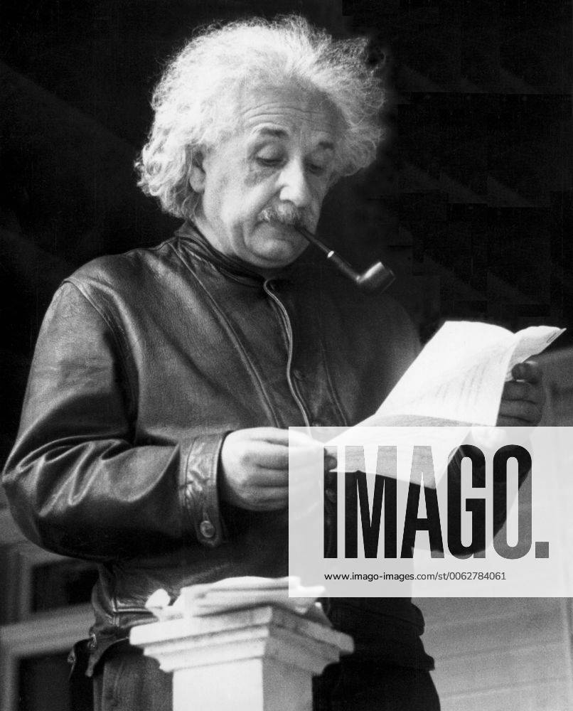 United States: May, 1938 Theoretical physicist Albert Einstein reading a letter 990_16_X-Einstein-Albert_1HR