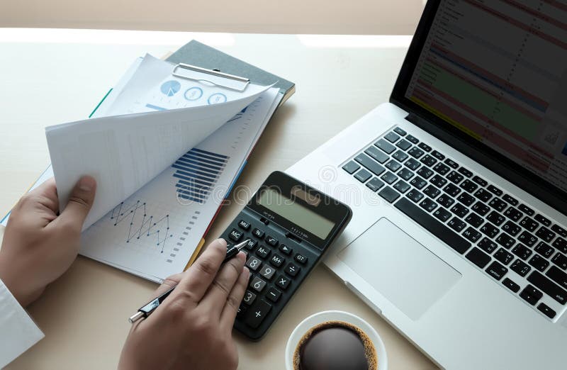Close up businessman using calculator on documents Unrecognizable finance use calculate about cost at office, Close up businessman using calculator on documents Unrecognizable finance use calculate about cost at office