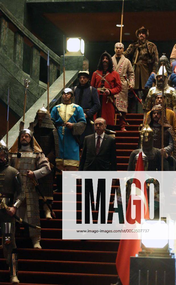 Turkish President Recep Tayyip Erdogan in front of 16 soldiers who represent the 16 Turkish states founded in the past at the presidential palace in Ankara, Turkey on January 12, 2015