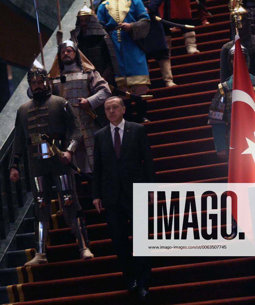 Turkish President Recep Tayyip Erdogan in front of 16 soldiers who represent the 16 Turkish states founded in the past at the presidential palace in Ankara, Turkey on January 12, 2015
