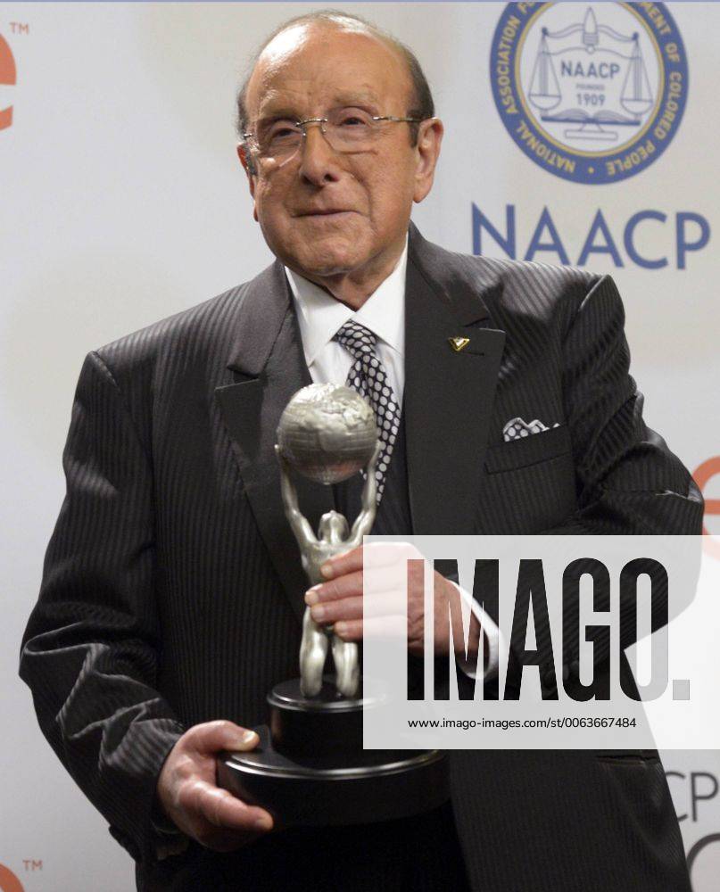 Record producer and music industry executive Clive Davis appears backstage with the Vanguard Award during the 46th NAACP Image Awards at the Pasadena Civic Auditorium in Pasadena, California on February 6, 2015. The NAACP Image Awards celebrates the accomplishments of people of color in the fields of television, music, literature and film and also honors individuals or groups who promote social justice through creative endeavors. LAP2015020699 PHILxMCCARTEN