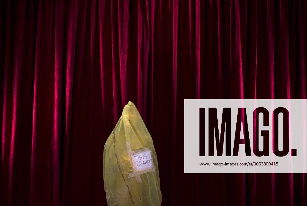 An Oscar statue is seen covered in protective plastic as preparations are underway for the 87th Academy Awards in the Hollywood section of Los Angeles on February 21, 2015. The Oscars will be presented on Sunday. WAP20150221304 KEVINxDIETSCH