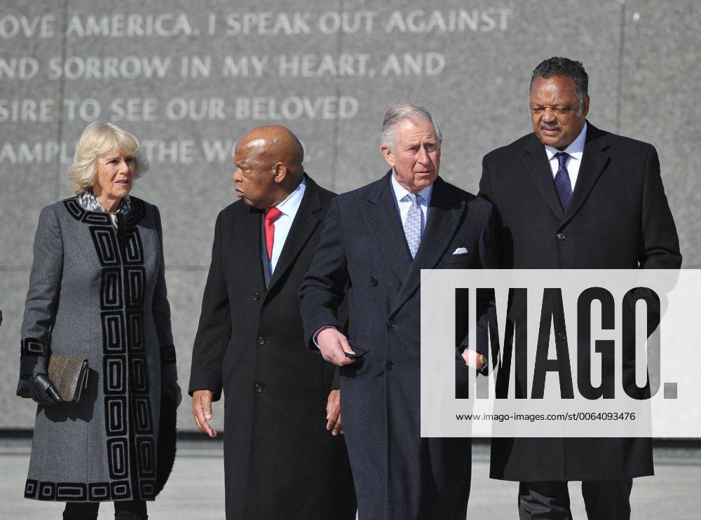 Britain s Prince Charles (2rd R) chats with civil rights leader Jesse Jackson while his wife Camilla (L), Duches of Cornwall chats with Rep John Lewis, D-GA, during a visit to the Martin Luther King Memorial Jr. Memorial on March 18, 2015 in Washington, DC. Prince Charles (C) and his wife Camilla, Duchess of Cornwall, are on a four-day trip to the United States. Pool WAX20150318158 MANDELxNGAN