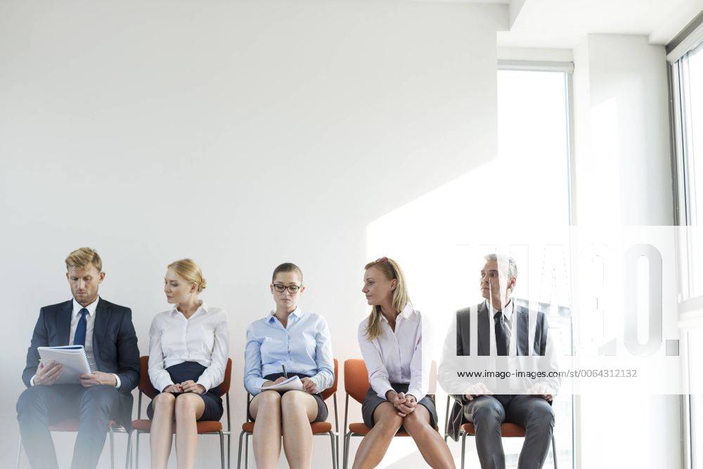 People sitting in a row, waiting for job interview model released Symbolfoto property released WESTF020940