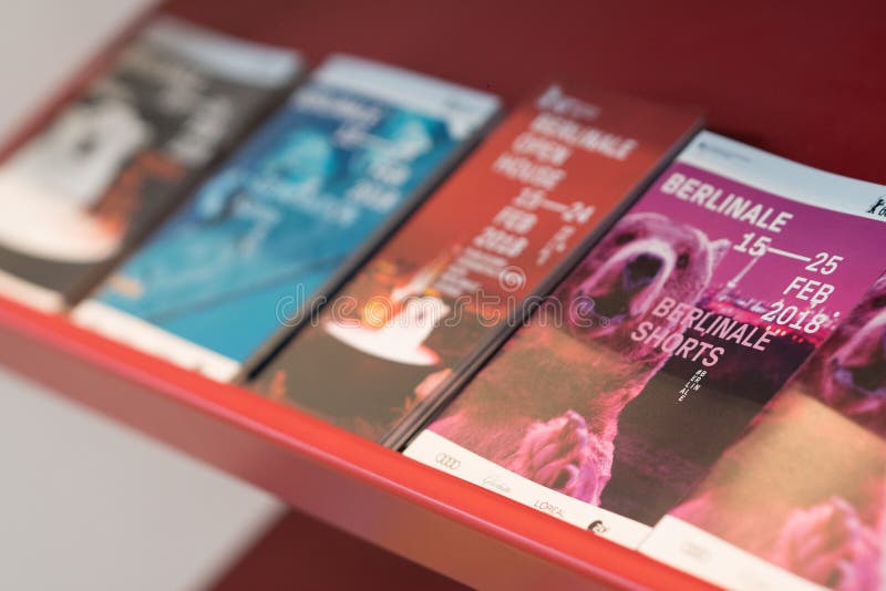68th Berlinale - Berlin International Film Festival 2018, Berlin, Germany - February 22, 2018: flyers and brochures of 68th Berlinale - Berlin International Film Festival 2018. The bear is the symbol of the Festival