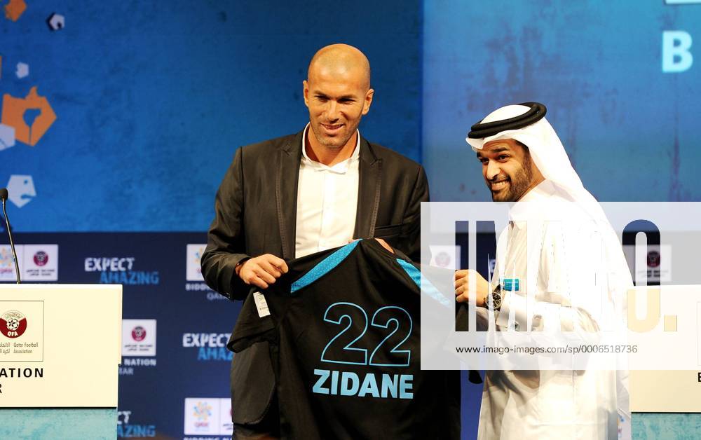 DOHA, Sept. 16, 2010 - Zinedine Zidane (FRA, L) receives a personalized jersey from CEO of the Qatar 2022 Bid Committee Hassan Al Thawadi in Doha, capital of Qatar, Sept. 16, 2010. Zinedine Zidane on Thursday accepted Qatar s invitation to become the official ambassador of the country s bidding for the 2022 FIFA World Cup finals.