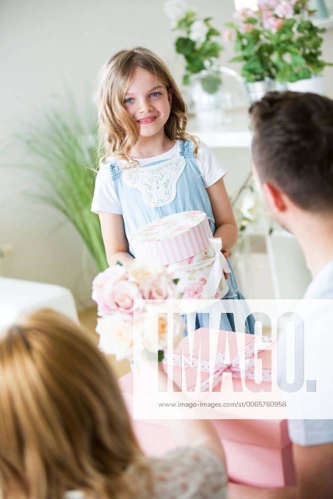 Little girl getting lots of presents for birthday model released Symbolfoto property released WESTF021504